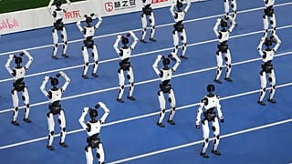 Robots perform during the opening ceremony of the World Humanoid Robot Games in Beijing, Saturday, Aug. 22, 2026.