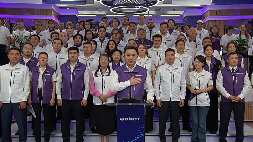 Adilet Party Chairman Aibek Dadebay addressed voters after the first exit poll results were released.