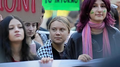 Thousands rally in Stockholm over climate crisis weeks ahead of general election 