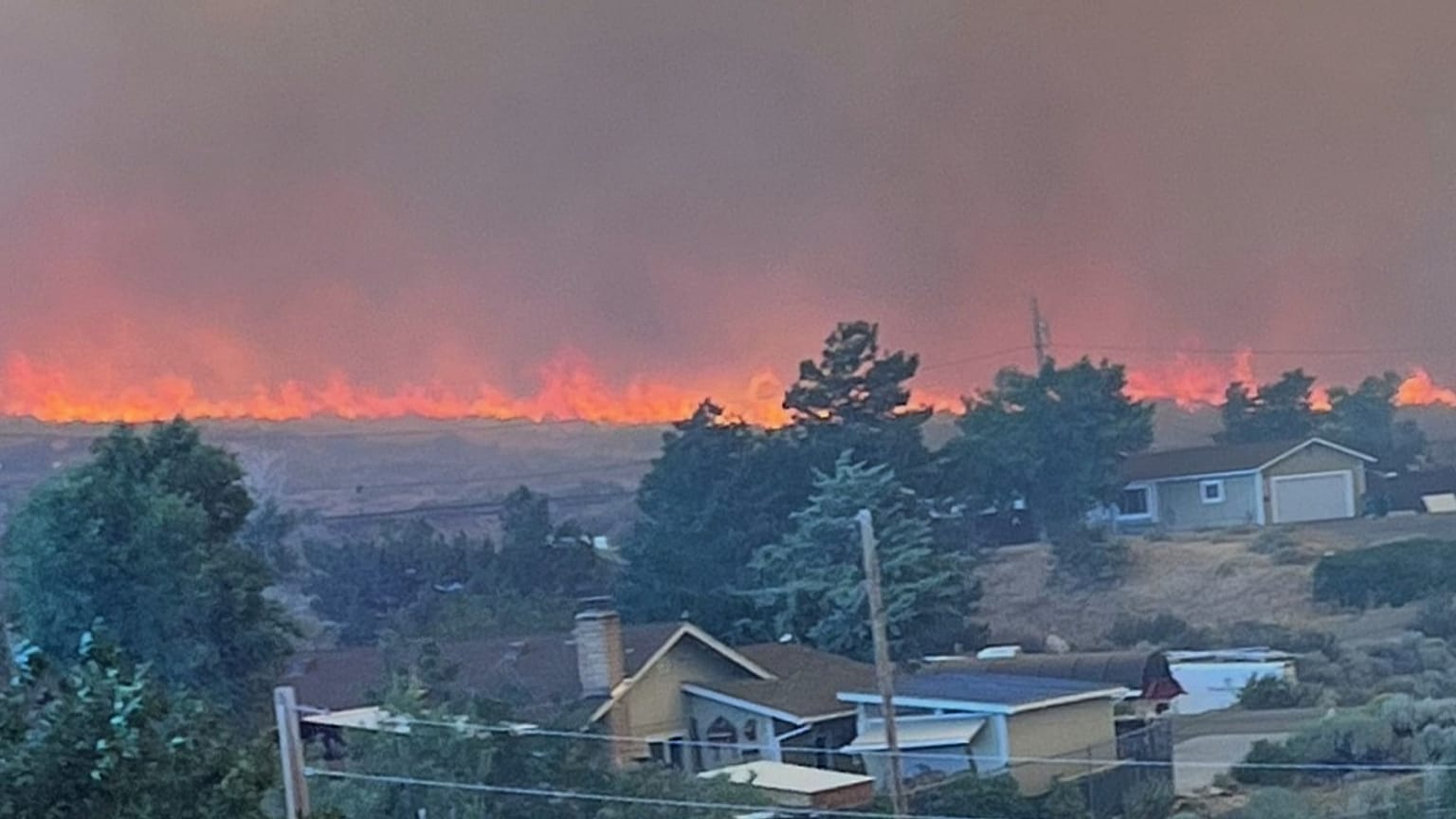 This image provided by Cari Kieffer shows part of the Hawk fire in Reno