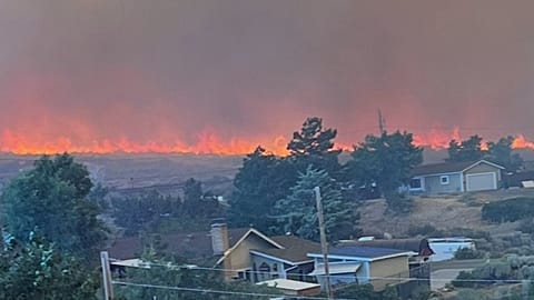 This image provided by Cari Kieffer shows part of the Hawk fire in Reno