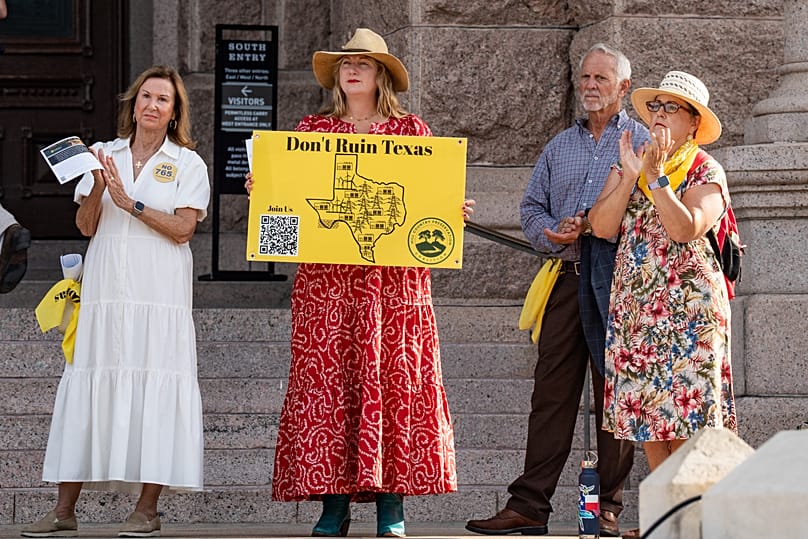 Activists attend a protest in opposition to data centres  in Austin, August 19, 2026. (Mikala Compton/Austin American-Statesman via AP)