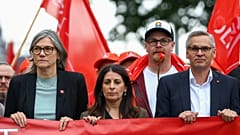 File - From left: IG Metall’s Christiane Benner, VW works council chief Daniela Cavallo and union official Thorsten Groeger at a Wolfsburg rally on 9 July 2026.