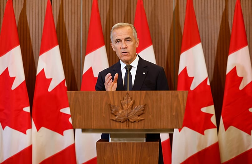 Prime Minister Mark Carney speaks about Canada's response to new U.S. tariffs during a news conference on Parliament Hill in Ottawa on Saturday, Aug. 22, 2026.