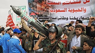 FILE: Houthi supporters hold a rally in Sana'a against the Saudi-led coalition, 17 July 2026