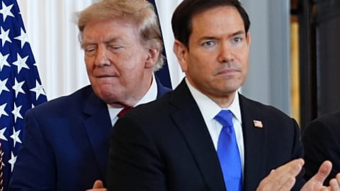 President Donald Trump walks past Secretary of State Marco Rubio as he arrives for a roundtable on the American mining industry, Washington, US. Friday, Aug. 7, 2026.