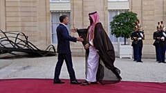 FILE: France's President Emmanuel Macron greets Saudi Crown Prince Mohammed bin Salman before a meeting at the Elysee Palace in Paris, 24 August 2025