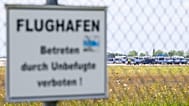 Police vehicles parked along the north runway at Leipzig/Halle Airport, 6 August, 2026
