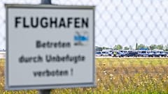 Police vehicles parked along the north runway at Leipzig/Halle Airport, 6 August, 2026