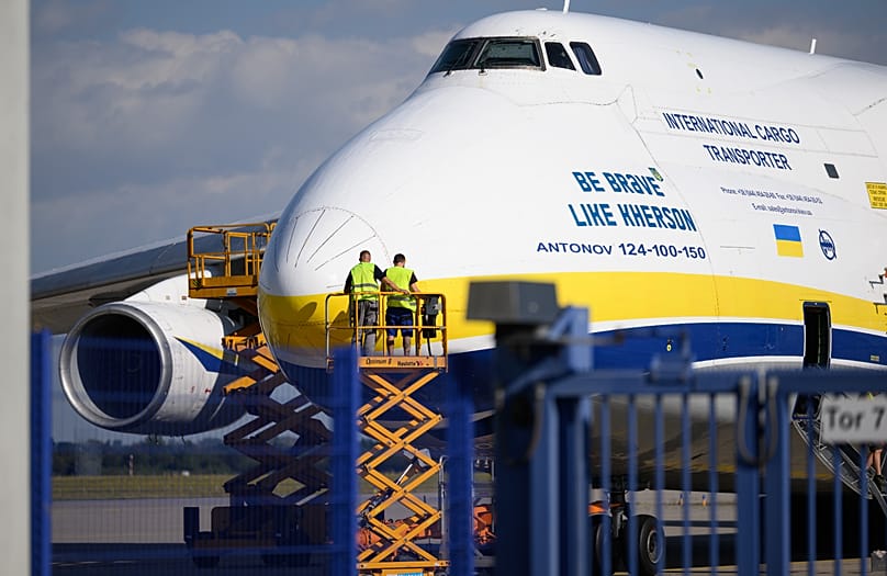 Ukrainian Antonov transport aircraft is parked behind a fence on the grounds of Leipzig/Halle Airport, 6 August, 2026