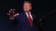 FILE: US President Donald Trump talks to reporters after arriving on Air Force One at Joint Base Andrews, MD, 11 August 2026