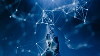 A robotic hand reaching into a digital network on a blue background, symbolizing AI technology