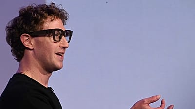 Meta CEO Mark Zuckerberg wears artificial intelligence-powered smart glasses and a wristband as he speaks during the company's Connect developer conference.