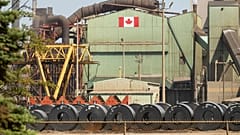 Rolled coils of steel sit in the yard at the ArcelorMittal Dofasco steel plant in Hamilton, Ont. on Thursday, Aug. 20, 2026.