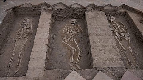 Skeletal remains inside the Espiritu Santo Hospital are exposed during excavation at the Sanctuary of Santa Rosa de Lima, in Lima, Peru, Tuesday, Aug. 25, 2026.