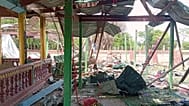 Debris litters a Buddhist monastery after an airstrike hit Swel Le Oh village in Myaung Township, 21 August, 2026