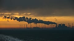 File - Wind turbines are seen as the sun rises over the northern Dutch port of Eemshaven, Netherlands, Monday 21 Jan., 2019. 