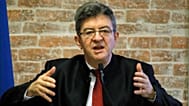 French left wing leader Jean-Luc Melenchon delivers a speech during a meeting on defense in Paris, Friday, March 31, 2017.  