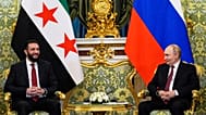 الرئيس الروسي فلاديمير بوتين (يمين) والرئيس السوري المؤقت أحمد الشرع يتحدثان خلال اجتماعهما في قصر الكرملين الكبير في موسكو، روسيا، يوم الأربعاء 15 أكتوبر/تشرين الأول 2025. 