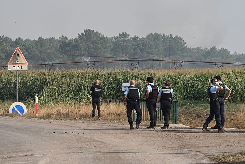Police stand at an intersection near a military domain in Saumos, 28 July, 2026 