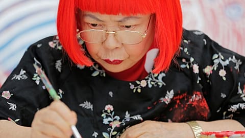 Japanese avant-garde artist Yayoi Kusama works at her studio in Tokyo, Wednesday 1 Aug, 2012. 