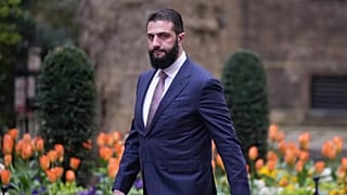 FILE. President of Syria Ahmed al-Sharaa walks towards 10 Downing Street to meet Britain's Prime Minister Keir Starmer in London, 31 March 2026