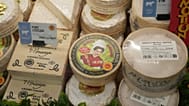 French cheeses are seen at an open air market, April 9, 2025 in Paris. 