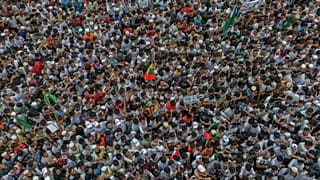 Rohingyas gather during an event at a refugee camp in Cox's Bazar, 25 August, 2026