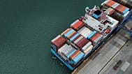 Cranes load and unload containers from cargo ships at the Panama Canal's Balboa port in Panama City. 24 July, 2026.