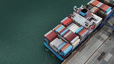 Cranes load and unload containers from cargo ships at the Panama Canal's Balboa port in Panama City. 24 July, 2026.