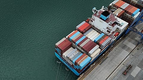 Cranes load and unload containers from cargo ships at the Panama Canal's Balboa port in Panama City. 24 July, 2026.