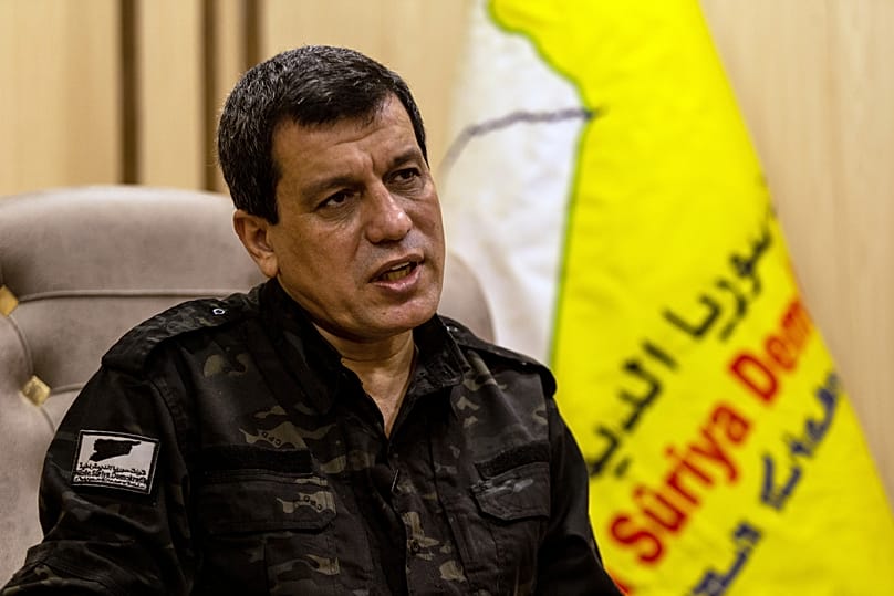 FILE: Mazloum Abdi, the commander of the US-backed Syrian Democratic Forces, speaks during a news conference in Hassakeh, Syria, 26 November 2022