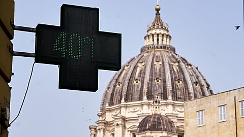 A pharmacy thermometer, with St Peter's Basilica in the background, reads 40 degrees Celsius, in Rome, Friday 28 August 2026. (AP Photo/Paolo Santalucia)