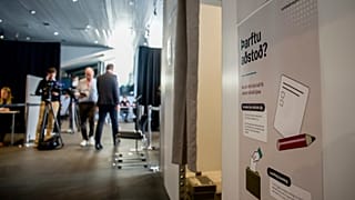 Voting assistance information is displayed beside polling booths at Reykjavik City Hall in Reykjavik, Iceland, Saturday, Aug. 29, 2026.