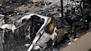 View of burnt ambulances in a car park at Golders Green in London, 23 March, 2026 