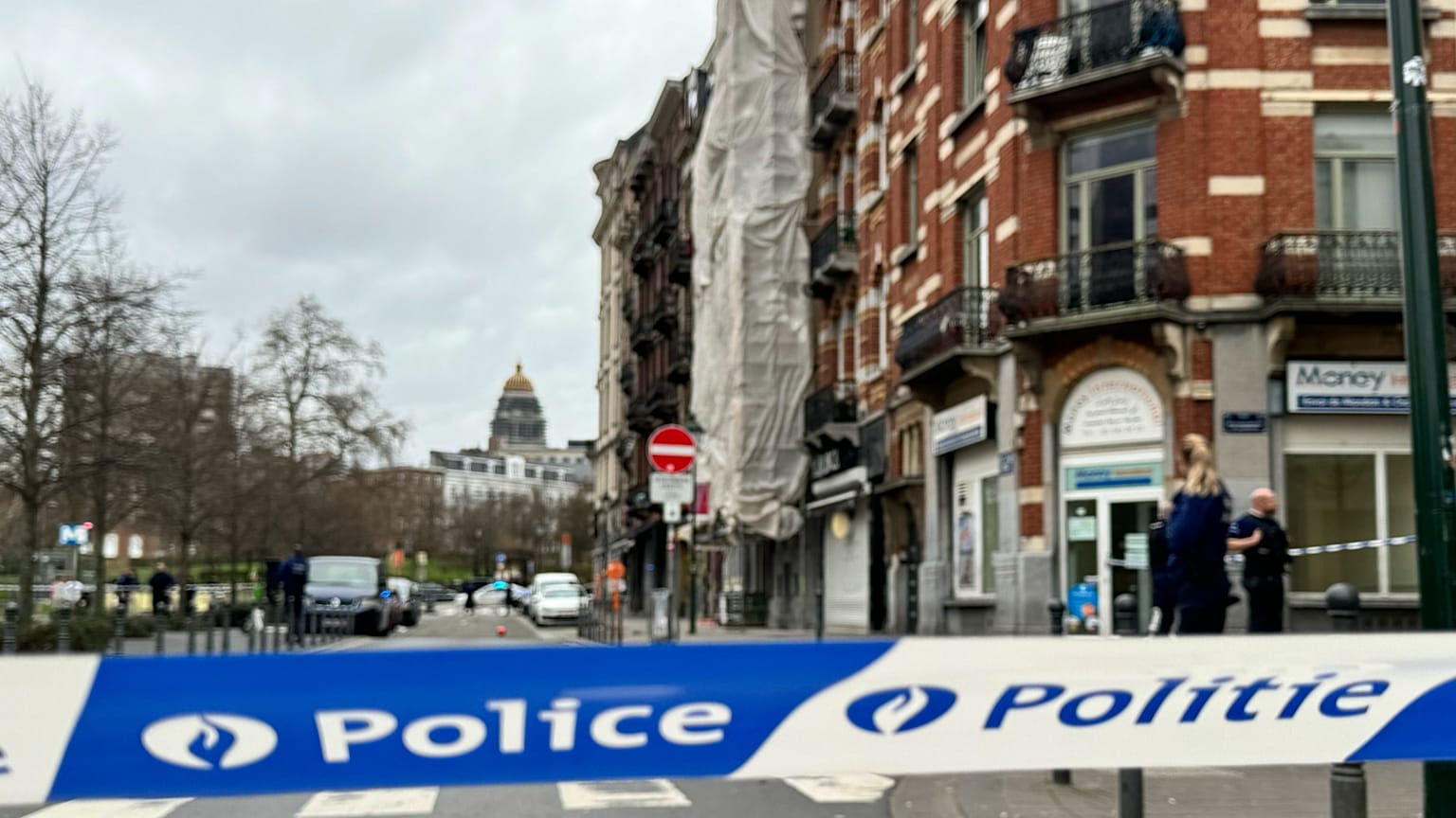 A police tape cordons off the scene of a shooting in Brussels, 13 February, 2024