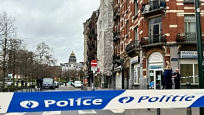 A police tape cordons off the scene of a shooting in Brussels, 13 February, 2024