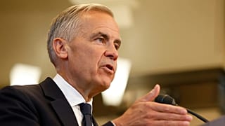Prime Minister Mark Carney speaks about Canada's response to new US tariffs during a news conference on Parliament Hill in Ottawa.
