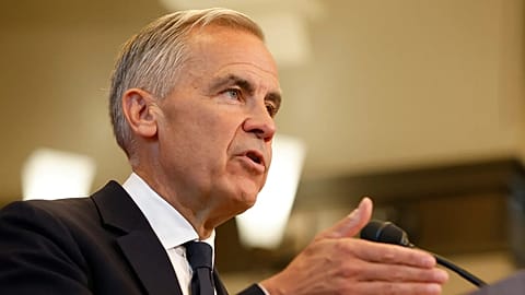 Prime Minister Mark Carney speaks about Canada's response to new US tariffs during a news conference on Parliament Hill in Ottawa.