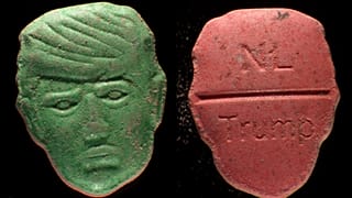 This undated photo provided by Trimbos Institute of Mental Health and Addiction shows pills that have a depiction of President Donald Trump on one side