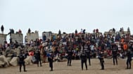 Migrants who crossed from Morocco into Spain return to a beach after being expelled from the area the previous day, 21 August, 2026