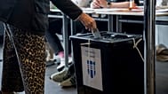 A voter casts a ballot during Iceland's referendum at Reykjavik City Hall in Reykjavik, Iceland, Saturday, Aug. 29, 2026.