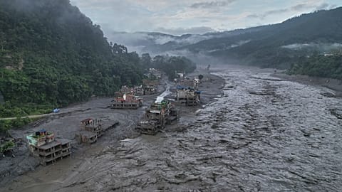 A drone view of the aftermath of flash flooding along the Trishuli river amidst fresh water surge warning in the Trishuli Bazaar area of Nuwakot district, Nepal, Sunday Aug 30