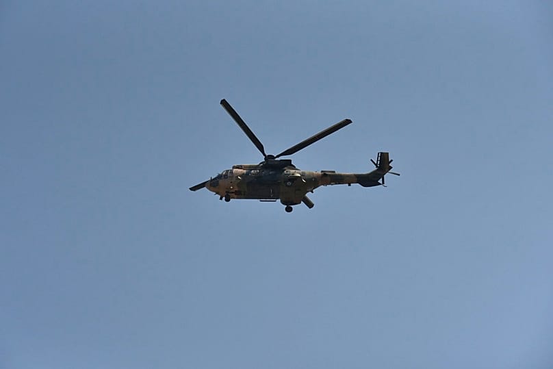 A helicopter flies over the port of Kyrenia in the Turkish-occupied northern part of Cyprus, 30 August, 2026