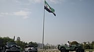 ويتبعه أشقاؤه، بشرى حفار يقود سيارة جيب ويليز، التي قام والده وسيم بترميمها، عبر دمشق، سوريا، الجمعة 14 أغسطس 2026. (AP Photo/غيث السيد)