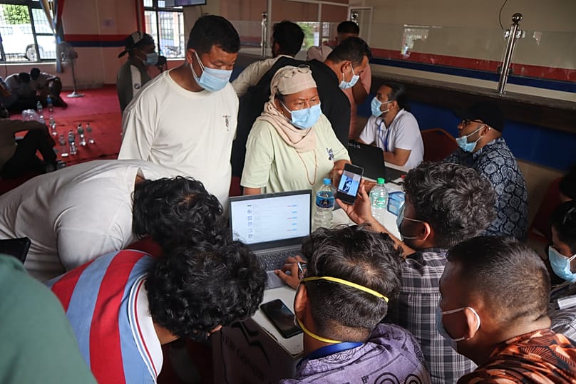 People inquire about the bodies of their relatives killed in flash floods at a mortuary in Chitwan, Nepal, Saturday, 29 August, 2026