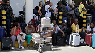 Passengers face long delays as Kenyan airport workers call strike