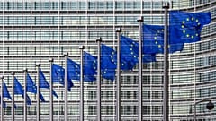 EU flags in front of the European Commission