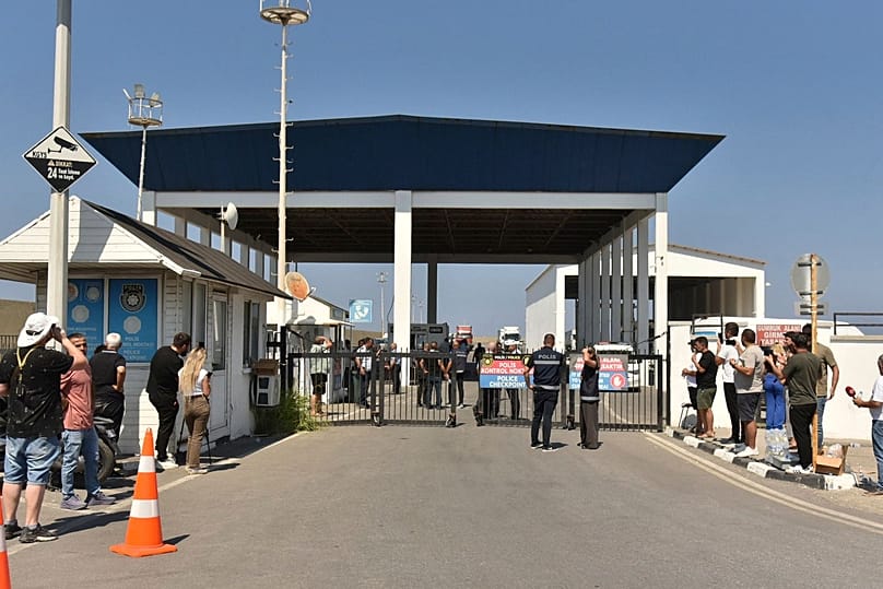 People gather outside the port of Kyrenia in the Turkish-occupied northern part of Cyprus, 30 August, 2026