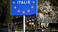 Cars line up for police checks before entering France from Italy at a border crossing in Menton, 13 November, 2022